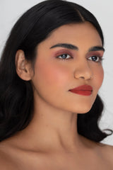 CLE Cosmetics revolutionaire Melting Lip Powder in de kleur Desert Rose voorbeeld