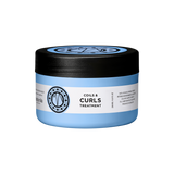 Maria Nila Coils & Curls Treatment is een finishing treatment die jouw krullen definieert, diep voedt en ontwart. 