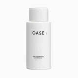 OASE Hair Thickening Shampoo. Deze hoogwaardige, lichte en sulfaatvrije shampoo is speciaal ontwikkeld om haargroei te stimuleren en haarverlies tegen te gaan. Dankzij de 13 actieve haargroei stimulerende ingrediënten voedt en kalmeert de shampoo niet alleen de hoofdhuid, maar legt het ook de basis voor een gezonde haargroei.