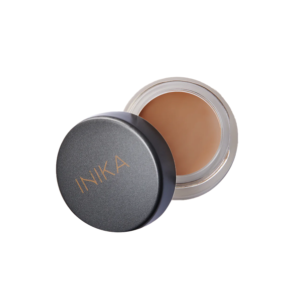 INIKA Organic Full Coverage Concealer Tawny is een natuurlijke romige veganistische concealer die oneffenheden, donkere kringen en vlekken camoufleert. Samengesteld met huidverzorgende botanische ingrediënten om de huid te hydrateren en te voeden zodat oneffenheden worden gecamoufleerd zonder de poriën te verstoppen.