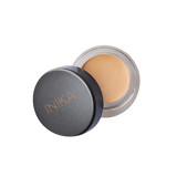 INIKA Organic Full Coverage Concealer Vanilla is een natuurlijke romige veganistische concealer die oneffenheden, donkere kringen en vlekken camoufleert. Samengesteld met huidverzorgende botanische ingrediënten om de huid te hydrateren en te voeden zodat oneffenheden worden gecamoufleerd zonder de poriën te verstoppen.